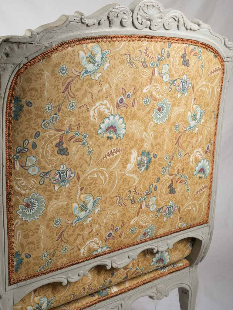 Richly detailed carved wood daybed