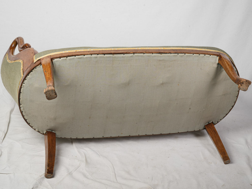 Graceful asymmetrical walnut settee  