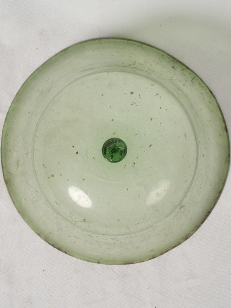 Petite greenhouse-inspired glass melon cloche
