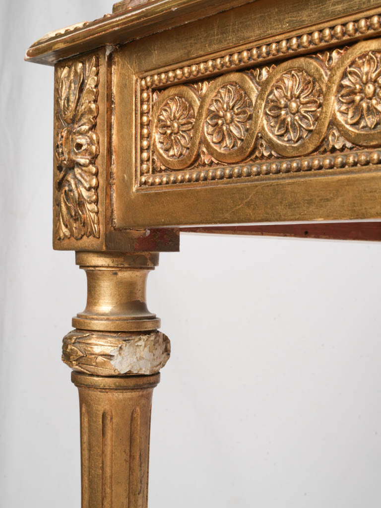Intricate carved friezes accent table
