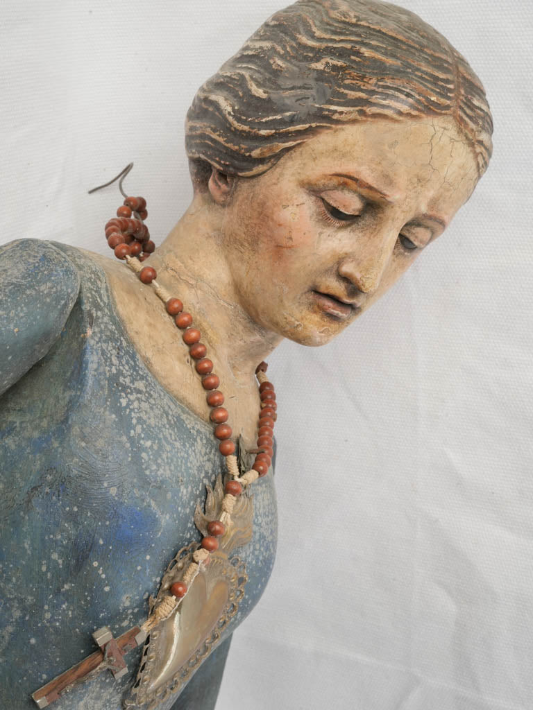 Serene polychrome figure sculpture