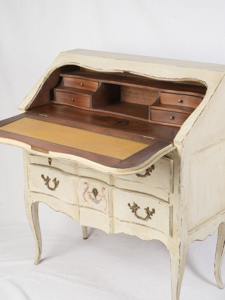 Softly patinated cream furniture