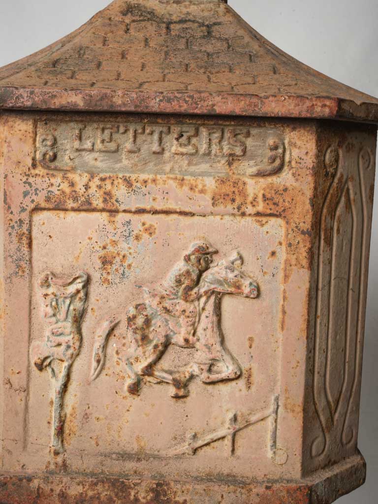 Artistic raised relief mailbox  