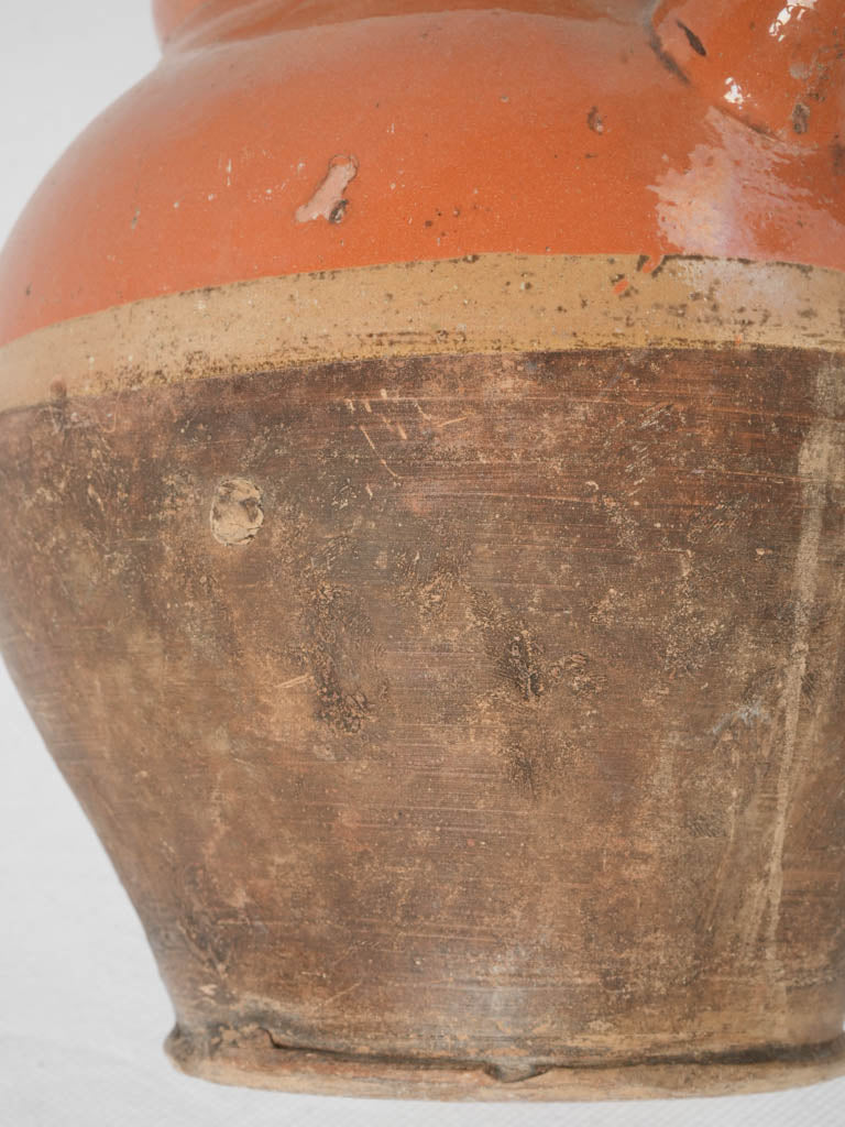 Colorful antique water cruche