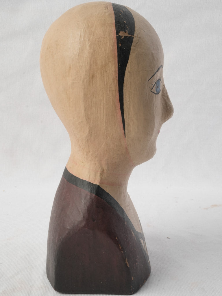 Distinctive painted aubergine sculpture