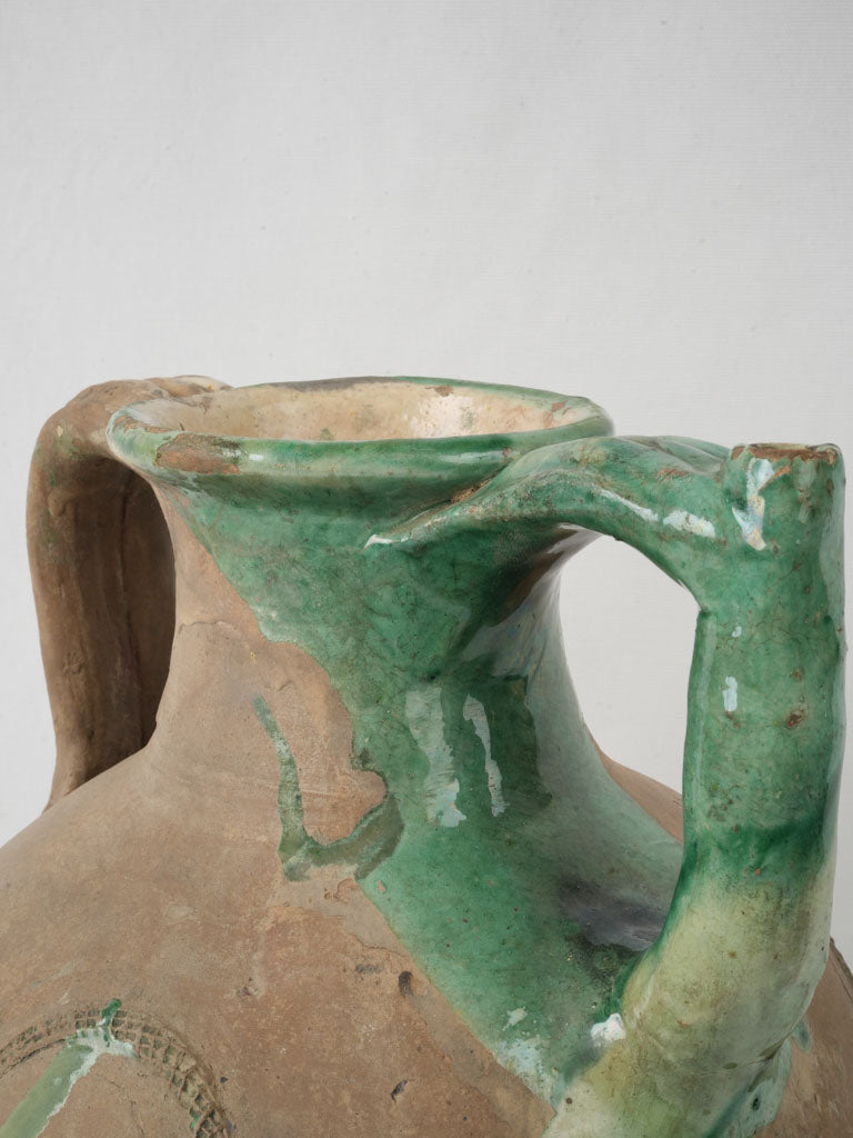 Earthy terracotta ornamental water jar