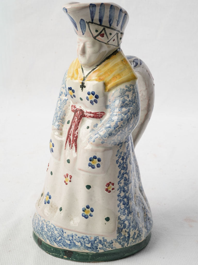 Antique handcrafted faience figure jug