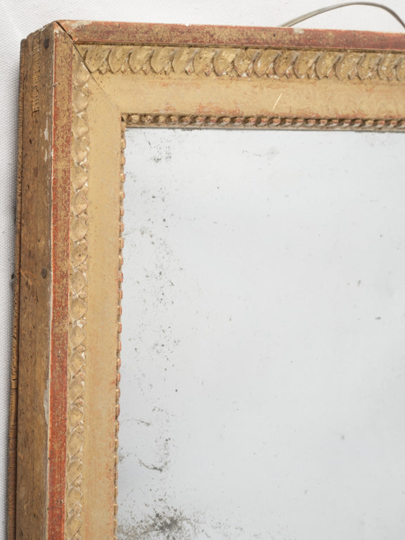 Timeless aged beaded motif mirror