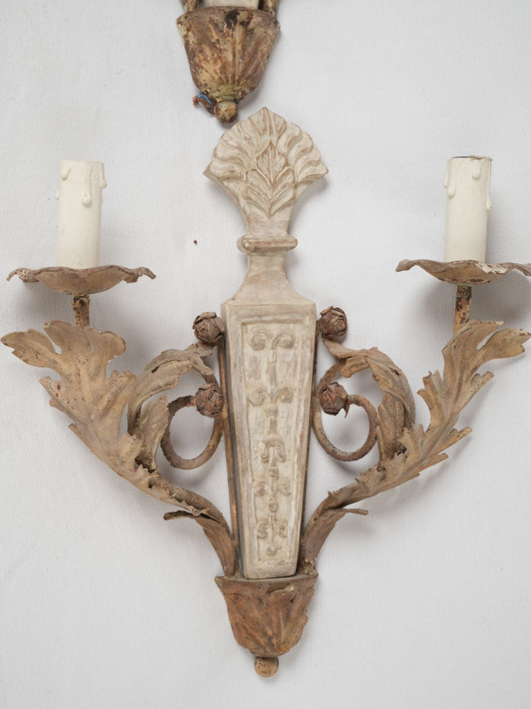 Whimsical metal foliage wall sconces