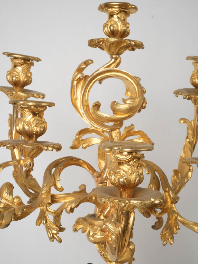 Intricately detailed Marchand clock ensemble