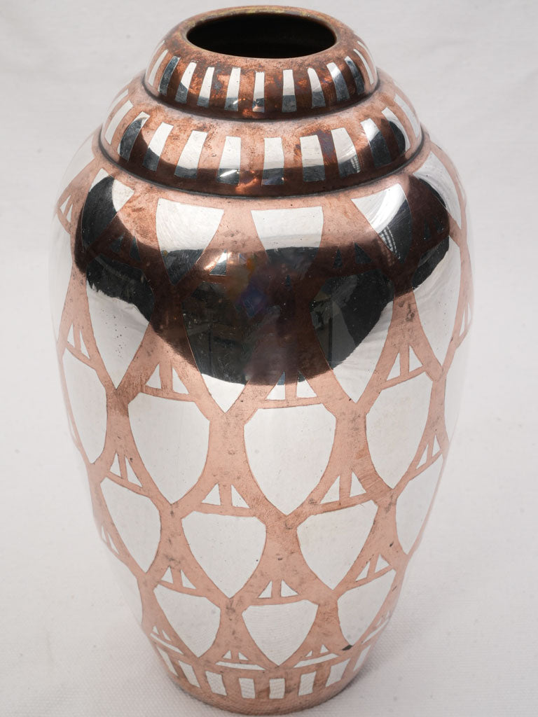 Silver-plated copper vase.