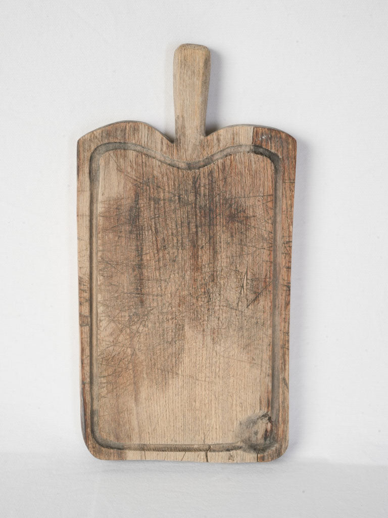 Antique rustic wooden chopping board