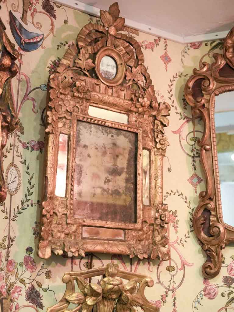 Atmospheric ornate Régence wall mirror