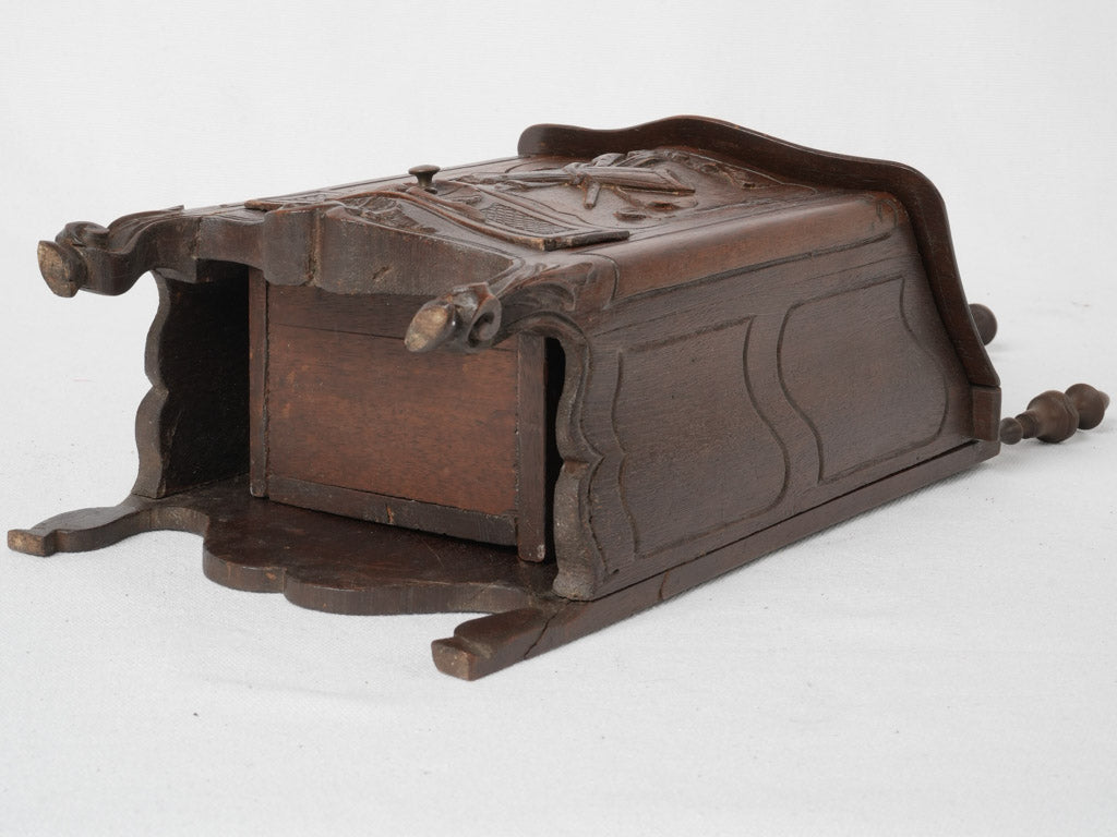 Delicate wall-mounted antique salt box