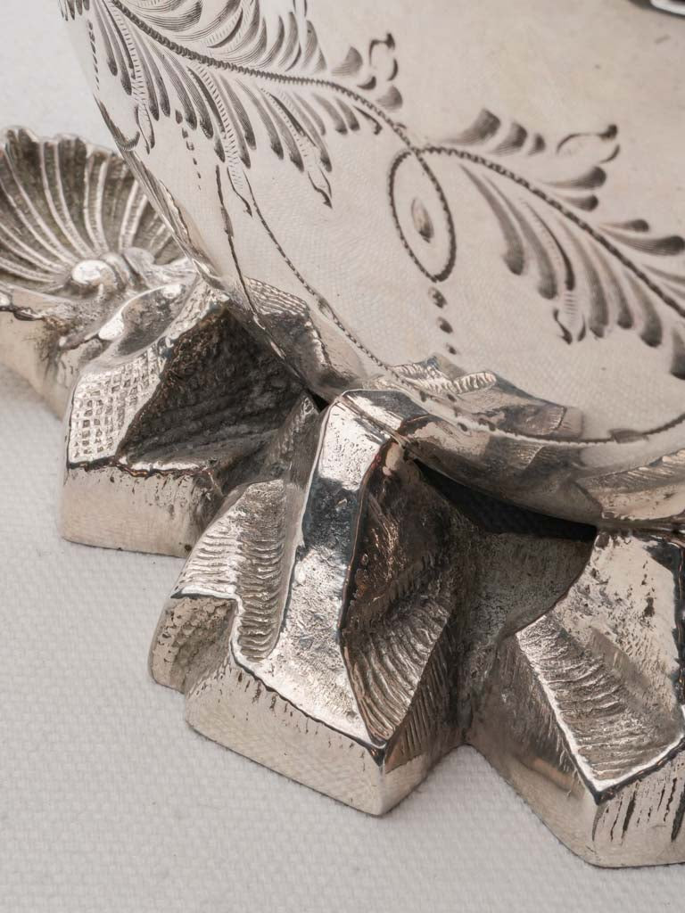 Intricate scroll motif spoon warmer