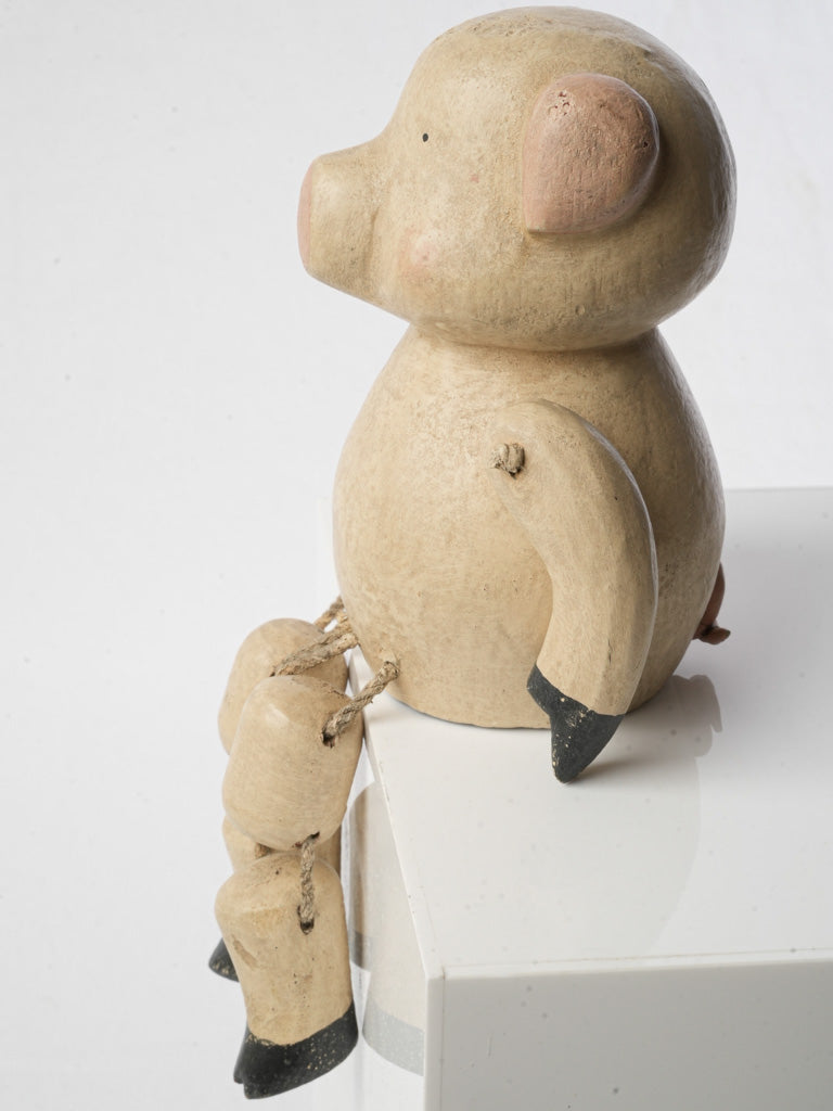 Rustic buff-toned piglet sculpture