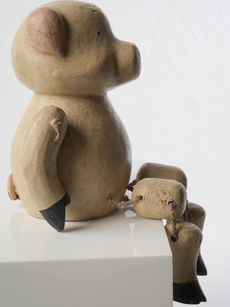 Time-softened patina piglet figurine