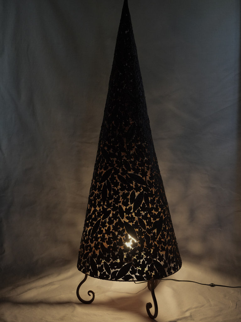 Rustic artisan-made metal floor lamp