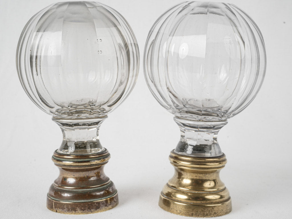 Clear, 19th-century stairway newel adornments