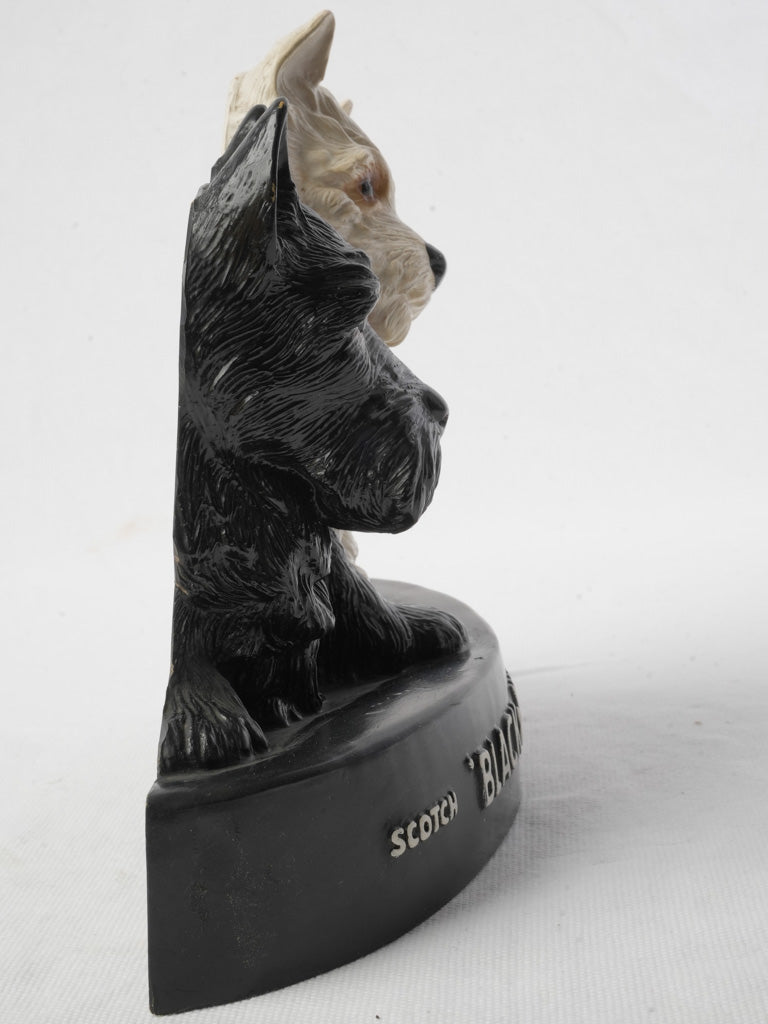 White lettering black oval base