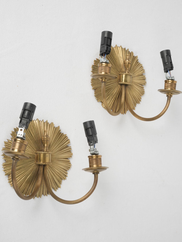 Gilt bronze sunburst wall sconces