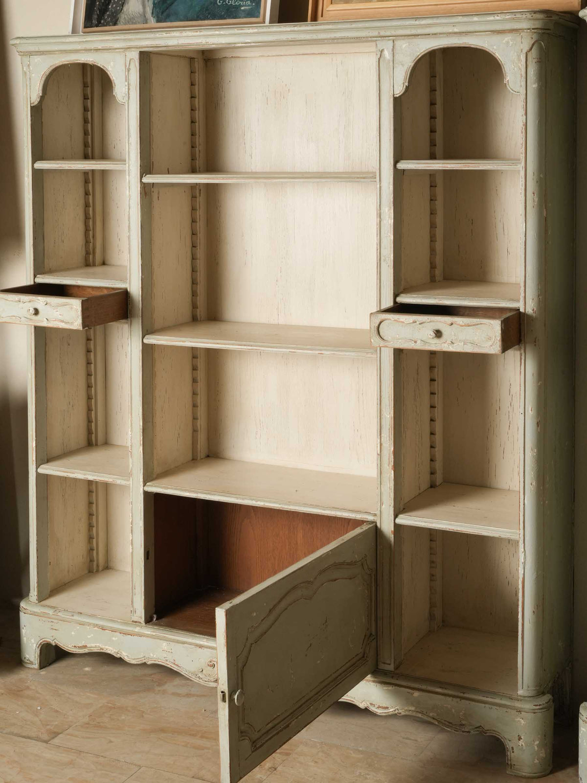 Layered celadon green bookcases