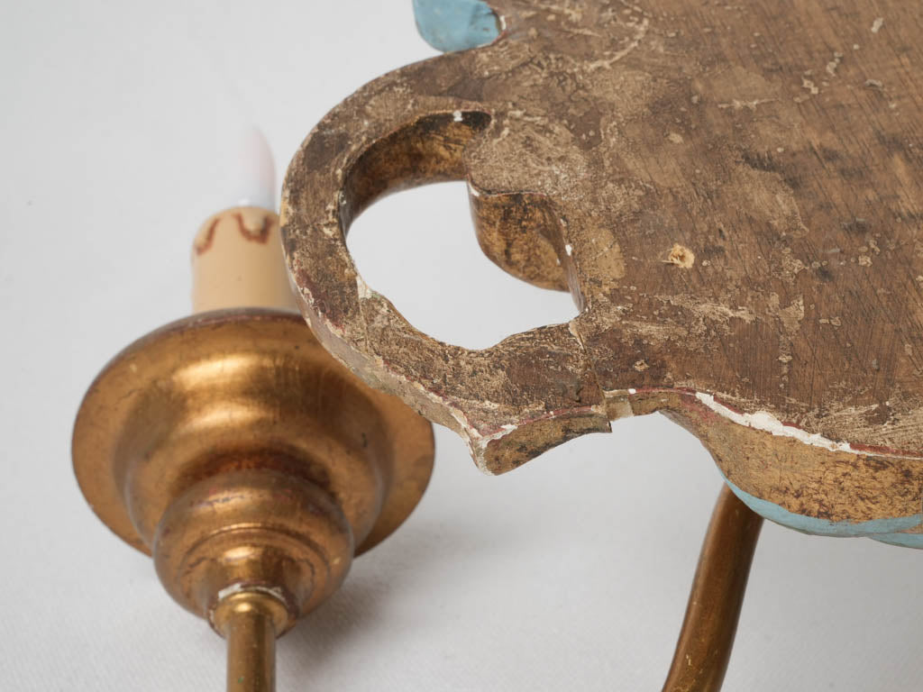 Intricate naturalistic antique sconces
