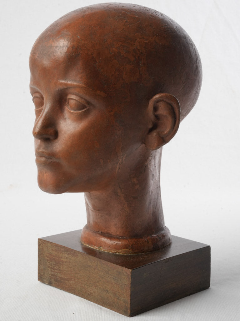 Antique clay adolescent statue