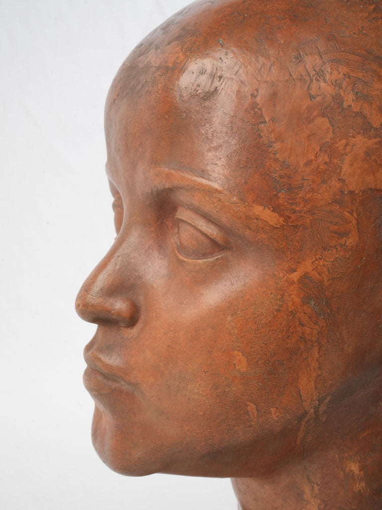 Sculptural slender-necked portrait figure