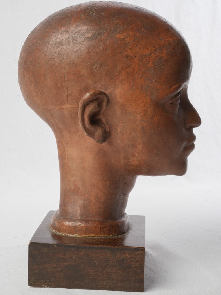 Subtle-detailed adolescent head statue