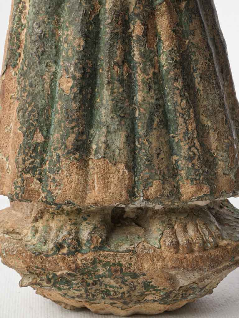 Aged devotional Krishna figure