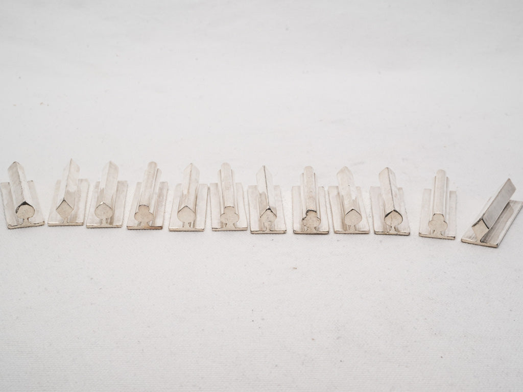 Collectible graphic silverplate implements