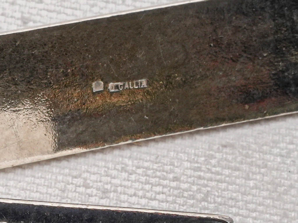 Gleaming silverplate knife rest collection