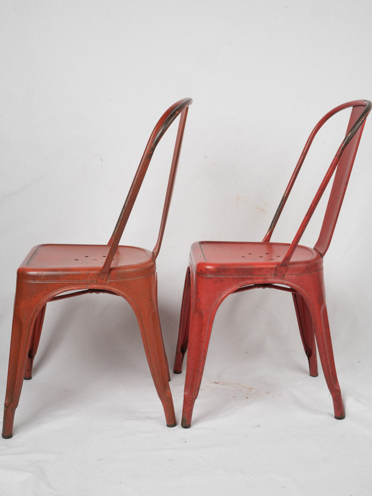 Perforated-seat steel Tolix chairs