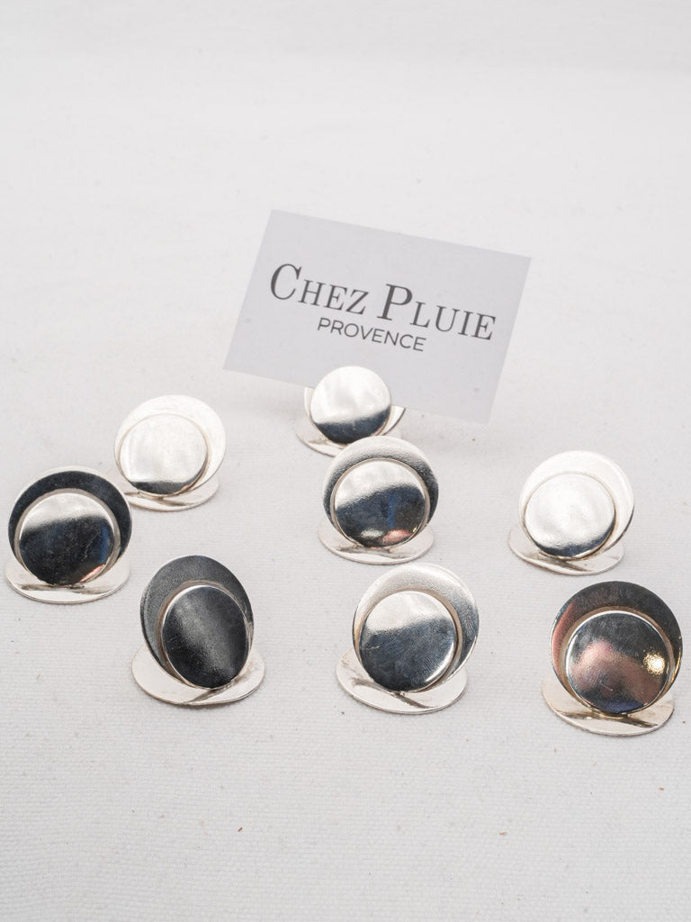 Understated silverplace card stands