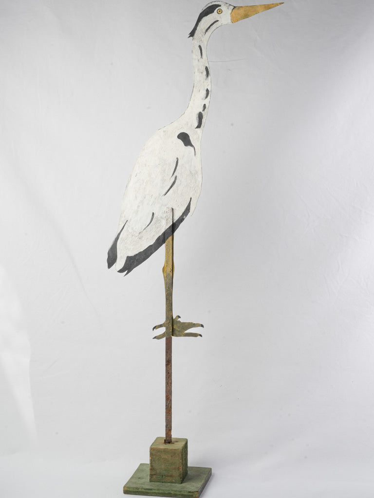Handcrafted metal heron sculpture