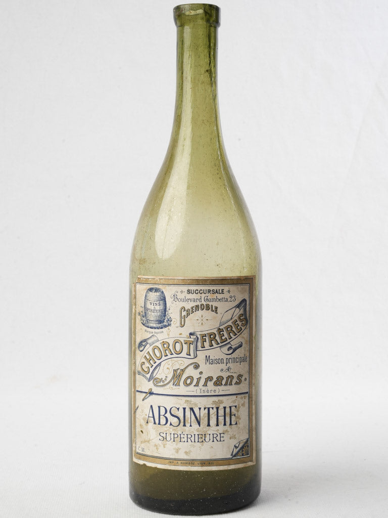 Antique olive-green glass absinthe bottle