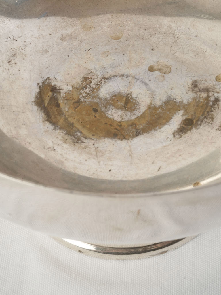 Iconic reflective silver vessel