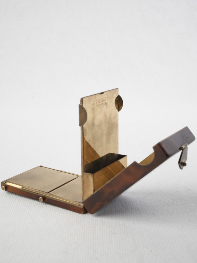 Antique tortoiseshell effect powder compact