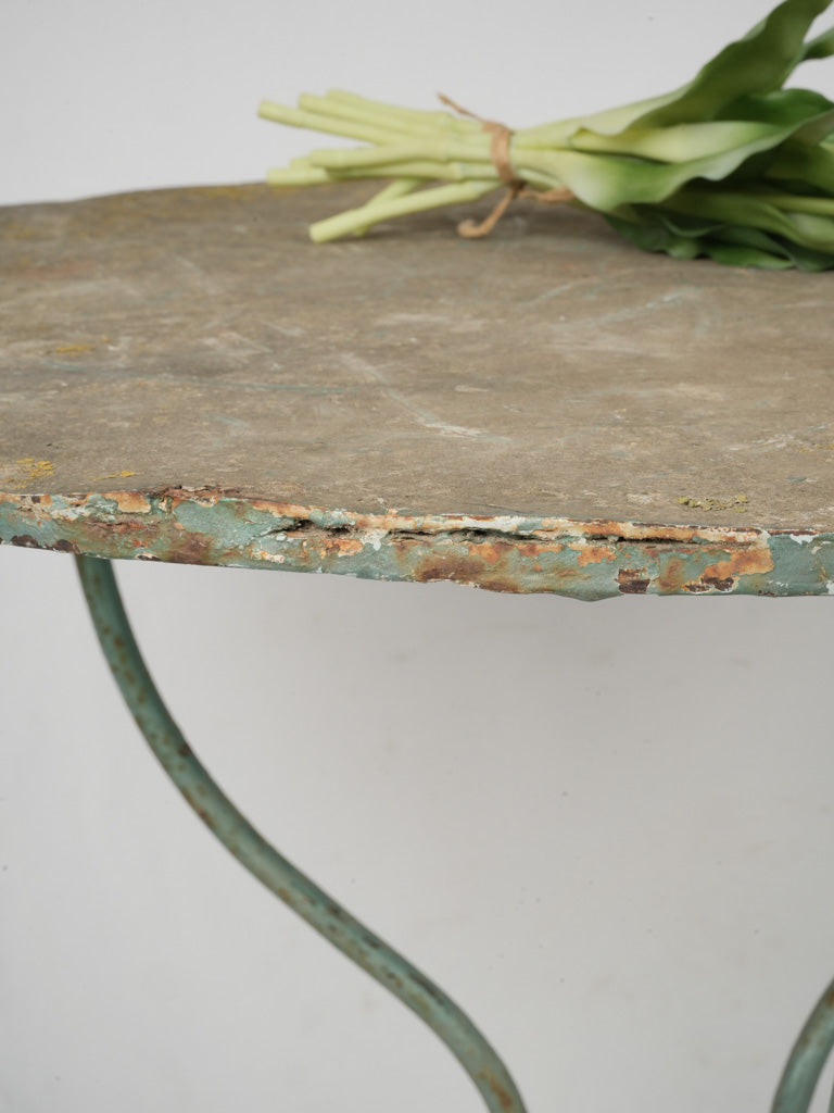 Robust vintage wrought iron table