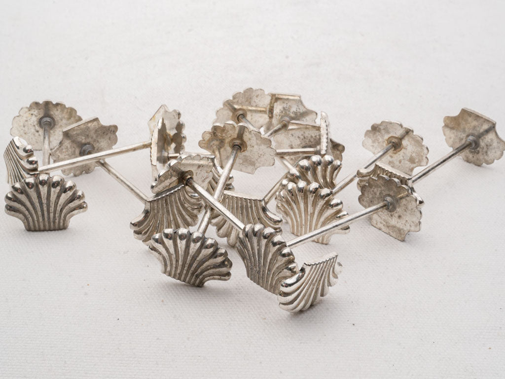 Graceful silver vintage knife rests