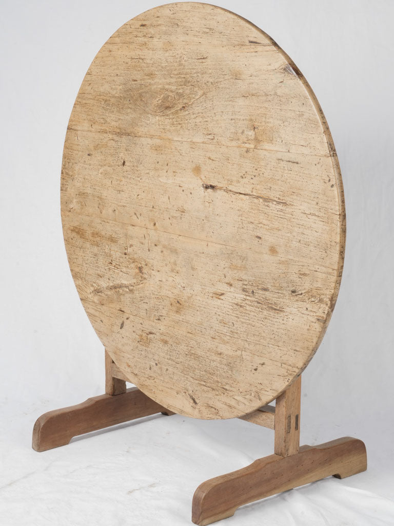 Rustic aged wooden round table