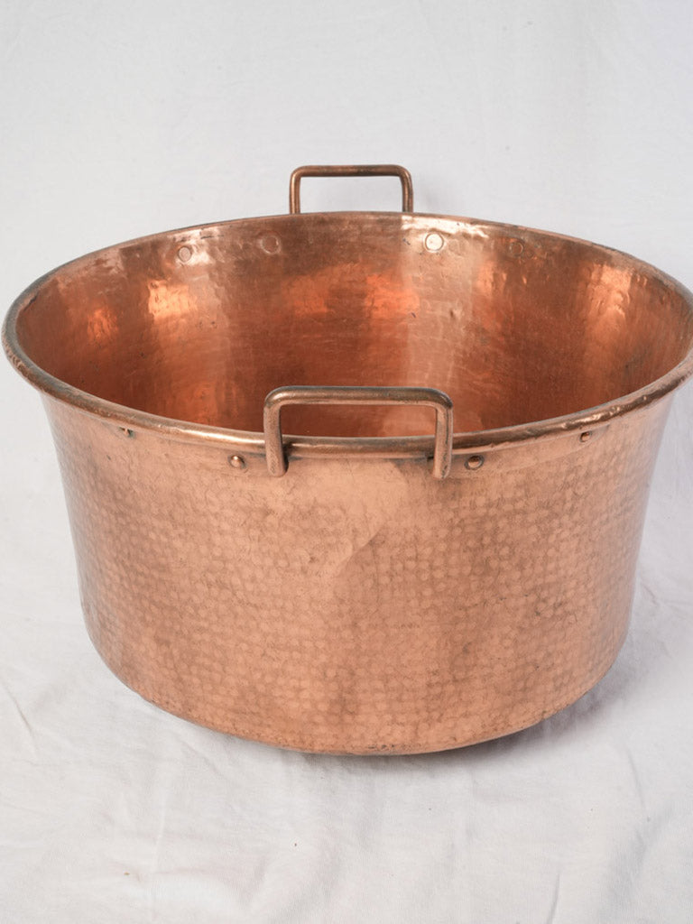 Decorative strap-handled copper basin