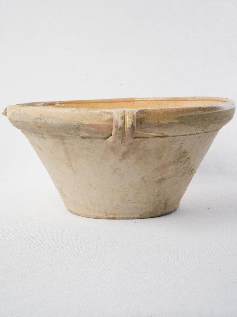Vibrant yellow glazed tian bowl
