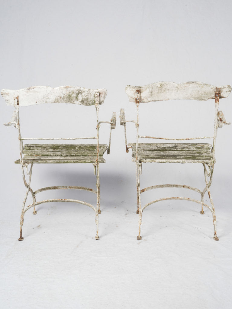 Moss-covered vintage-style armchairs