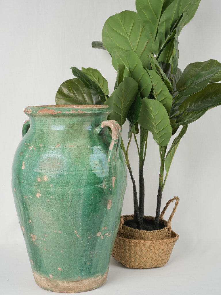 Tall century-old Tournac pottery