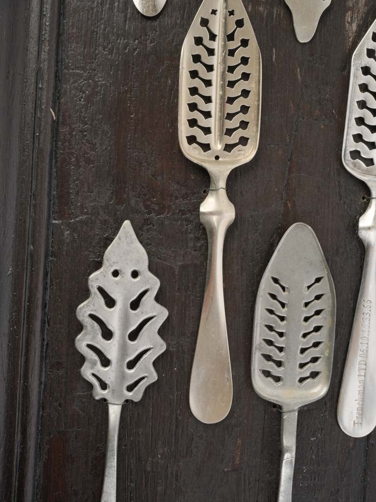 Patina-rich iron spoons wall art
