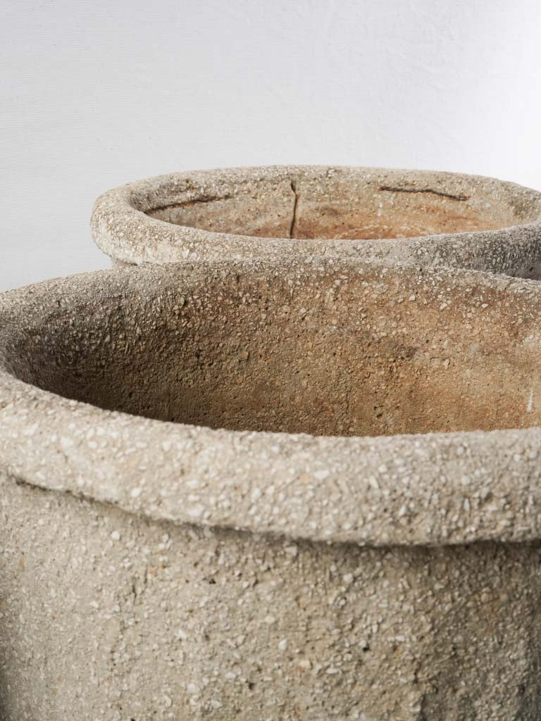 Weathered patina concrete garden urns