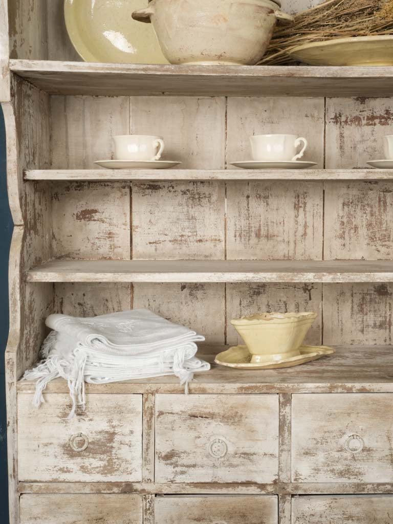 Timeworn white baker's cabinet