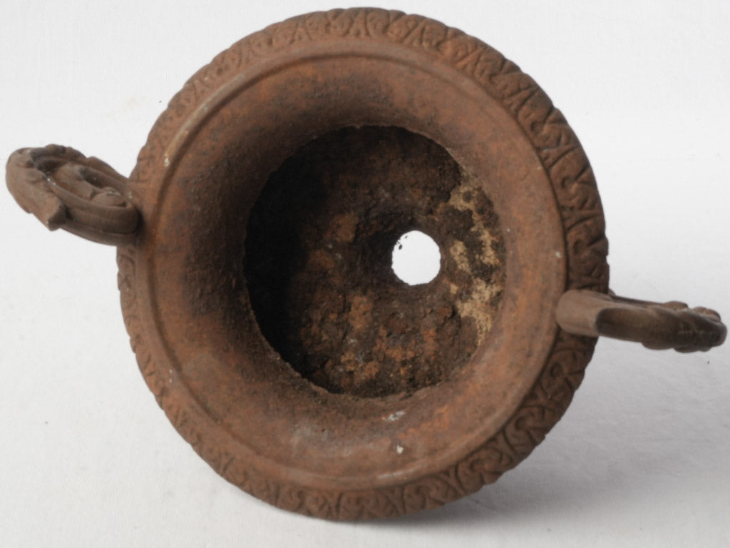 Patinated ornate vintage urn